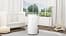 LG 30L Dual Inverter Dehumidifier with Ionizer quietly operating in a modern indoor space