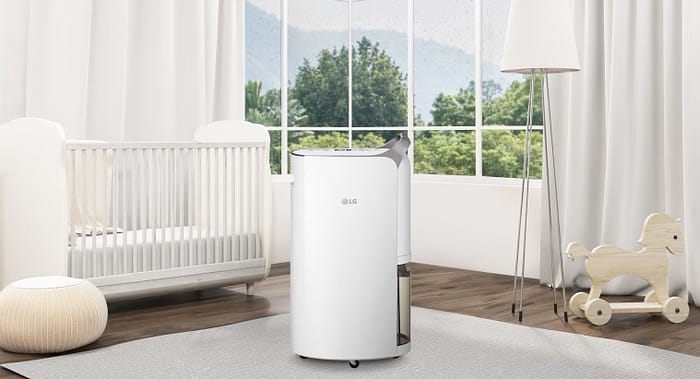 LG 30L Dual Inverter Dehumidifier with Ionizer quietly operating in a modern indoor space
